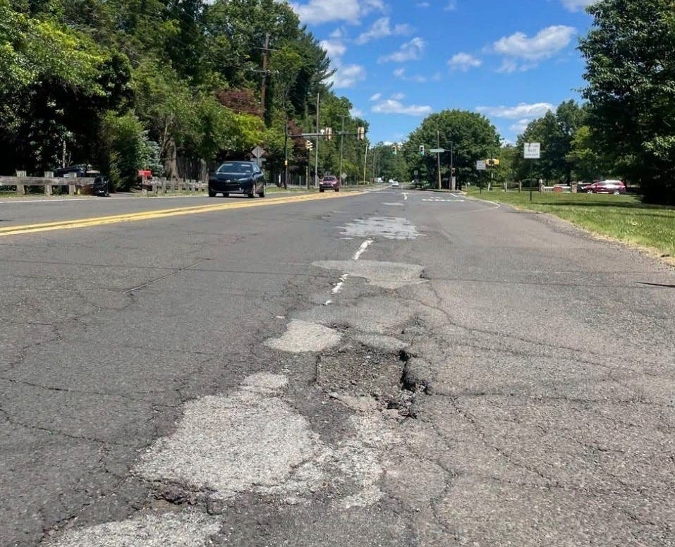 The deteriorating roadway along State Street.