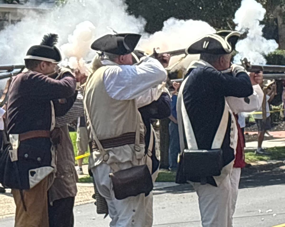 Musket fire fills the street in Newtown.
