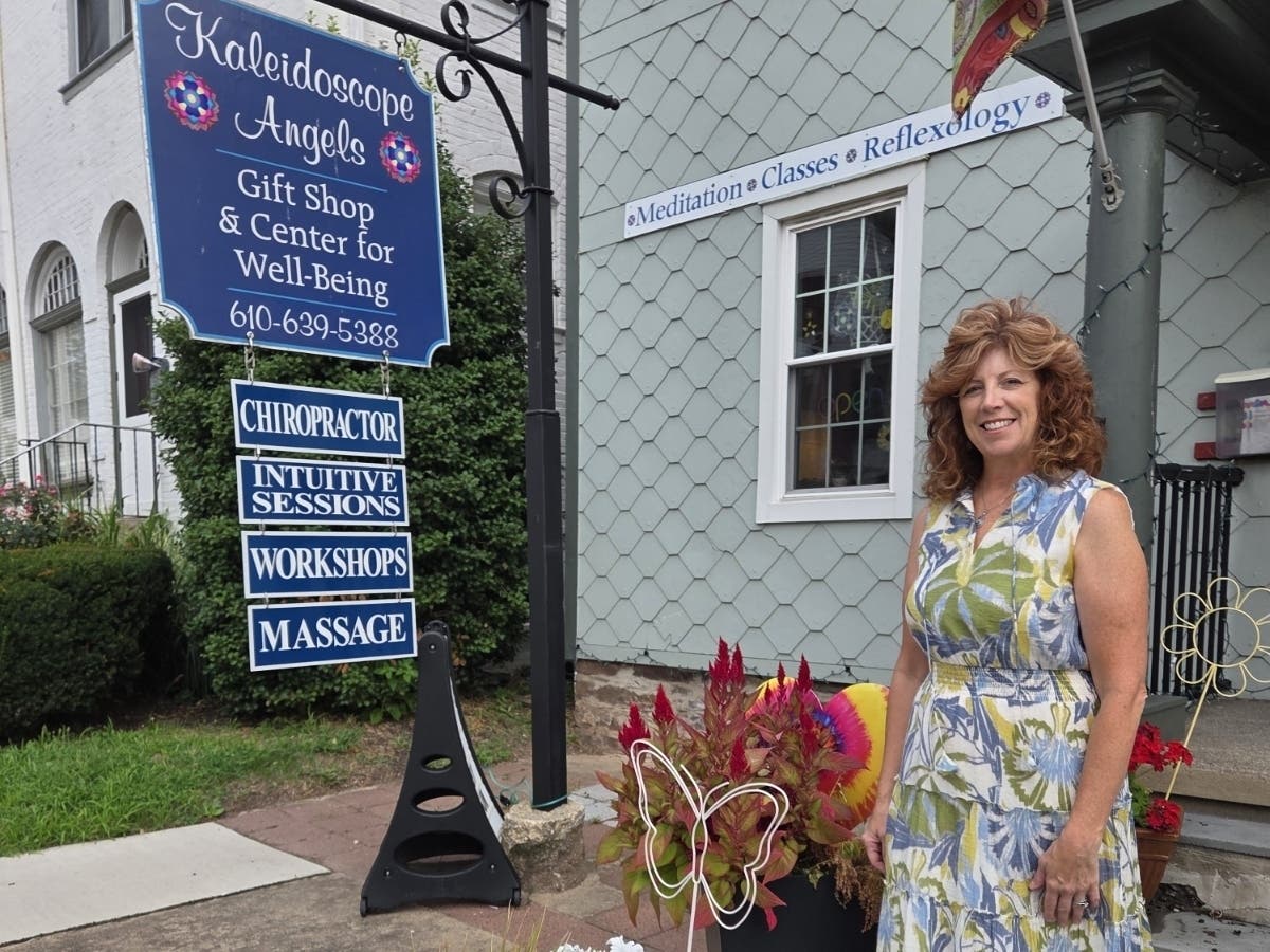 Jen Weber in front of Kaleidoscope Angels.