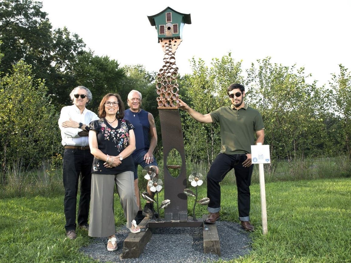 Students from Bucks County Community College's Intro to Sculpture Class show off
their mixed-media creation “Birdhouse Bacchanal." From left: Ali Vafaee of Princeton,
Monique Perry of Churchville, Dave Miller of Yardley, and Ryan Roberts of Bensalem.