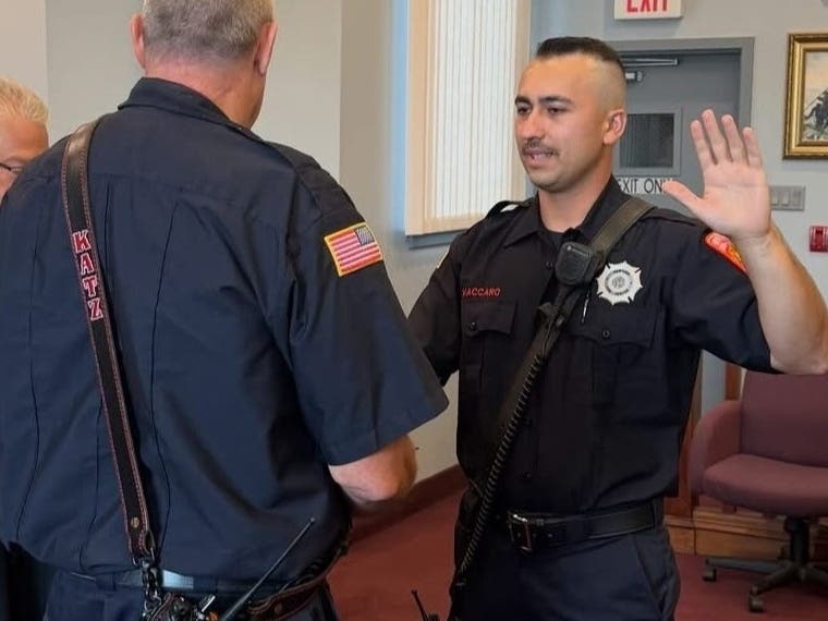 Firefighter Anthony Vaccaro takes the oath as Newtown Fire Rescue's newest career firefighter.
