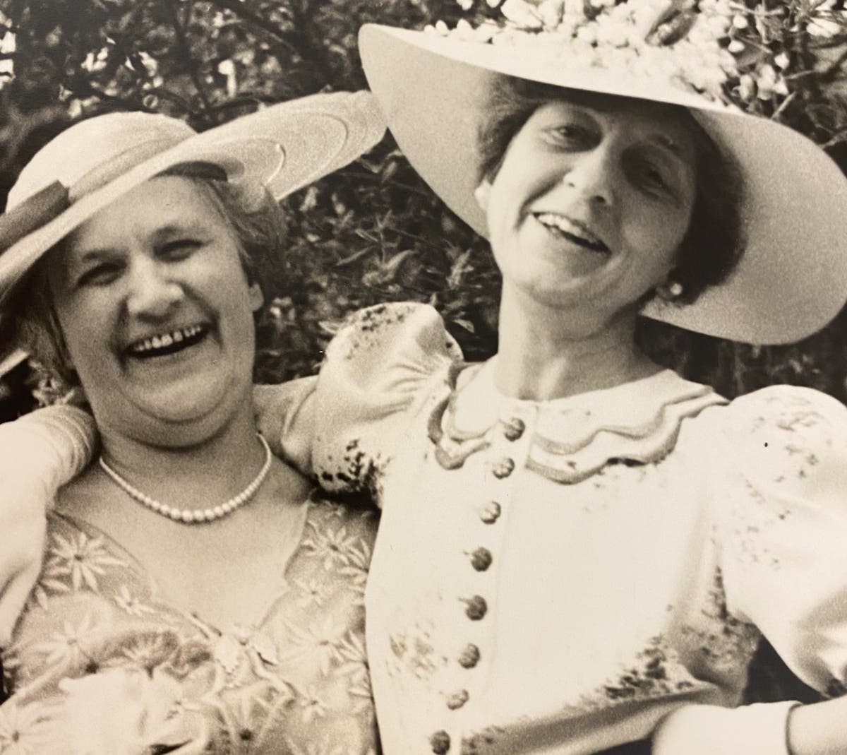 The sartorial style of Stella Elkins Tyler (right) is the inspiration behind the latest
exhibition at Bucks County Community College. Tyler is seen here in a 1937 photo with Elizabeth Doughten celebrating the wedding of their children.