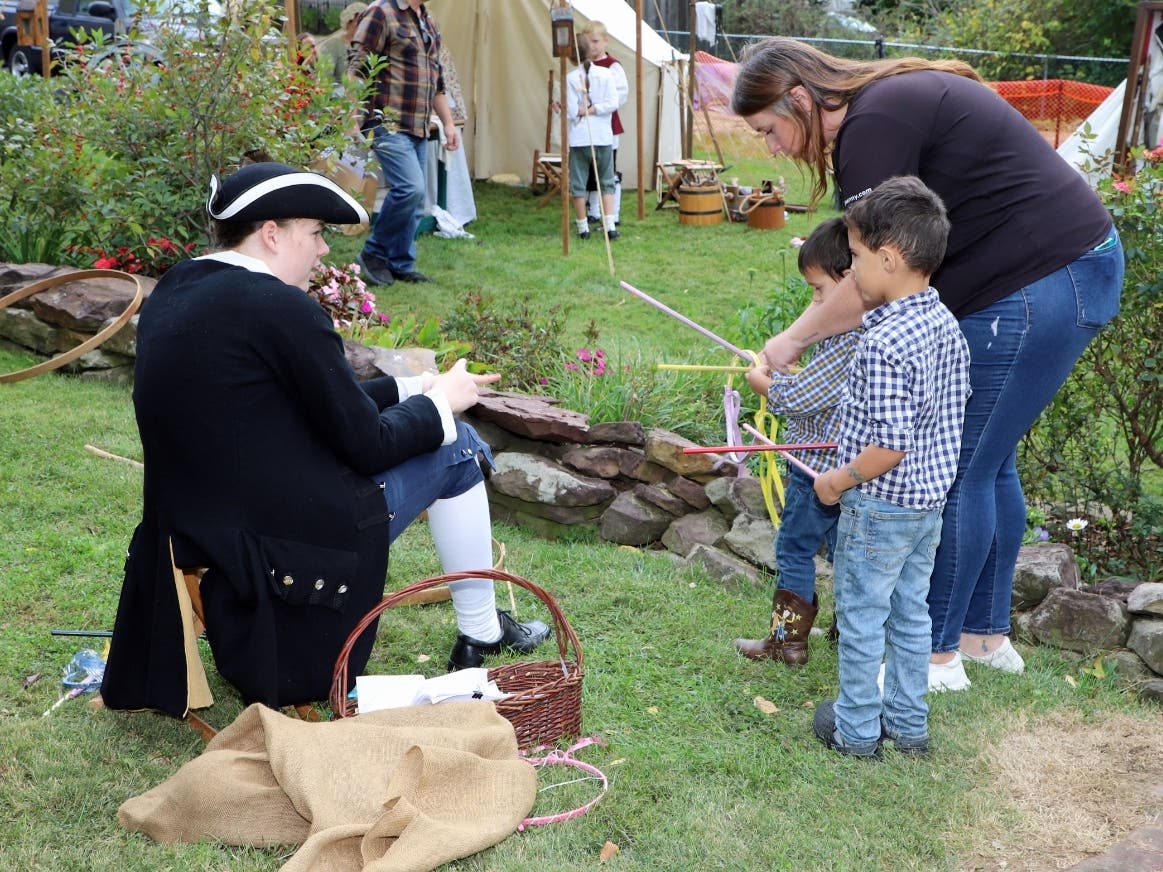 Market Day unfolds on Saturday at the historic Half-Moon Inn at Court Street and Centre Avenue in Newtown.