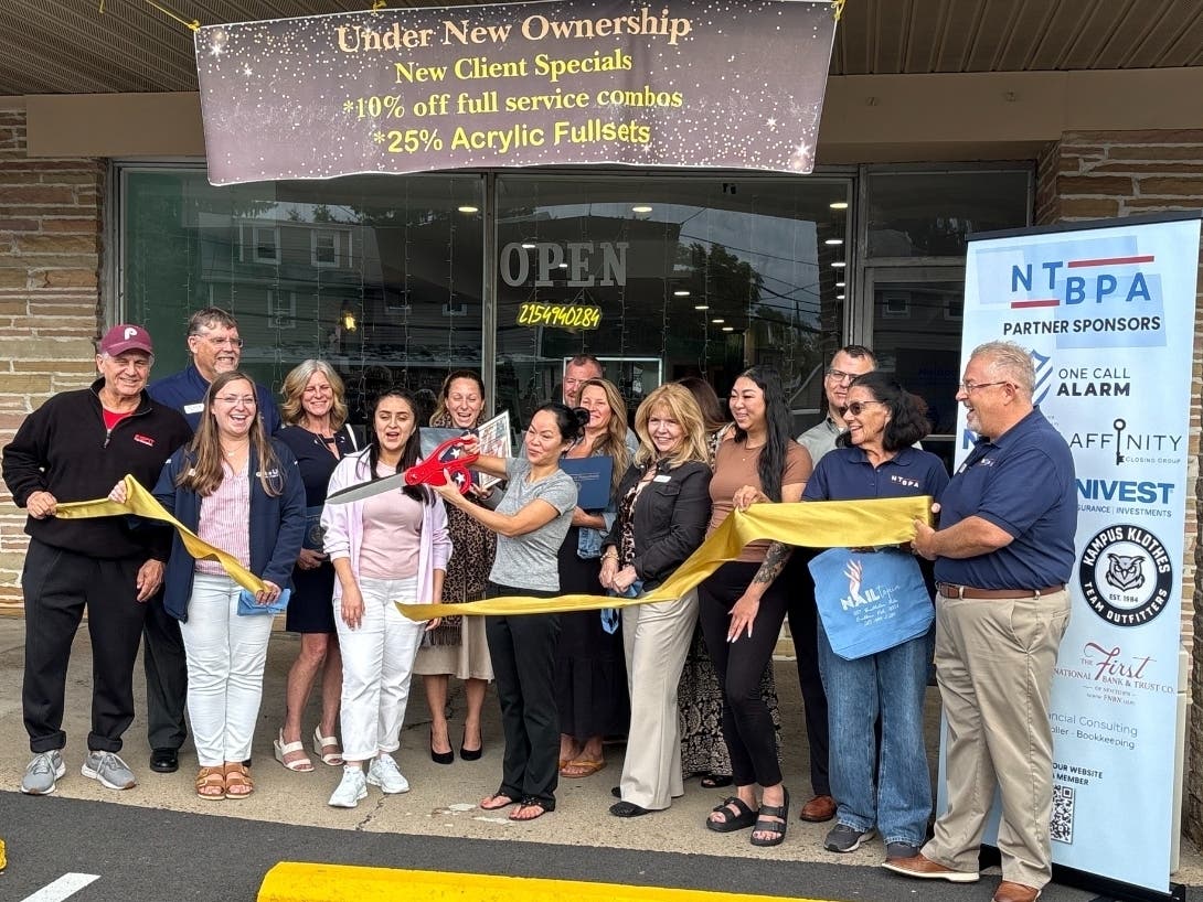 Katherine Nguyen cuts the ribbon on her second Nailtopia store.