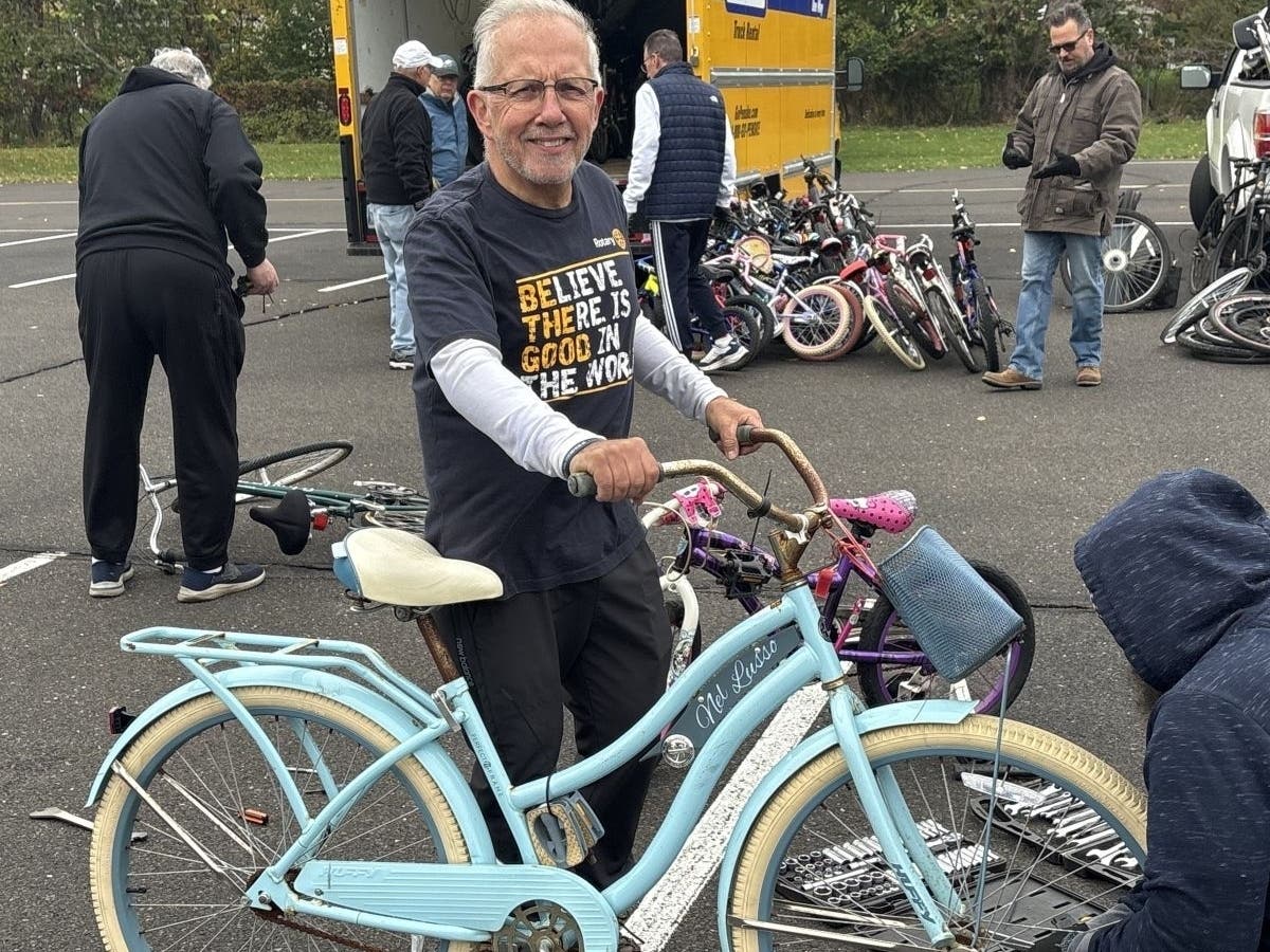 Dr. Jerry Agasar with one of the donated bikes at Saturday's collection.