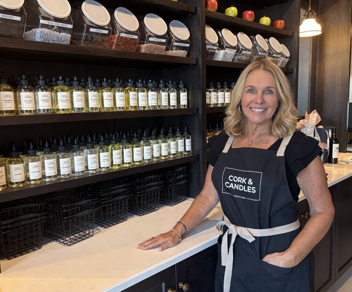 Bucks County Cork & Candles franchise owner Linda Welles inside her new Warrington store.