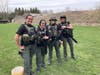 Officer Kristen Romac, left, is an expert in defensive tactics instruction and training, becoming one of the Department’s first TASER instructors. She later went on to become a Master TASER Instructor and joined the firearms training unit.  