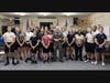 Current Civil Air Patrol cadets gathered with Ensign Sean Skinner, U.S. Navy, after a recent meeting. Skinner returned to his old squadron to encourage the teens to work hard and never give up when pursuing their goals.