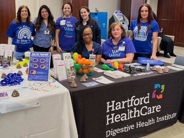 Dr. Andrea Marcus and DHI team at St. Vincent's Medical Center dress in blue for colorectal cancer awareness month.