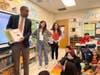 At the end of the session, Zoey presented Lieutenant Governor Delgado with a book from the workshop, "The Name Jar" by Yangsook Choi, which was signed by all the students.