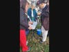 Pouring tea.  L-R:  Stacey Bassett-Regent Katoctin  DAR, Paula Schwoerer-Elizabeth McIntosh Hammill DAR, Chip Daniel-CJW-II VA SAR, Barry Schwoerer-SMJC VA SAR, Ken Bonner-SMJC VA SAR. Blue bucket "Boston Harbor" beneath table