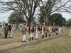 Musket Squad marching to position.  Barry Schwoerer, Musket squad commander leading the column.  Mark Sink ready to join the squad in green jacket to left of column