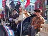 Left side of float showing R-L: Jim Cordes, Richard Tyler,  Barry Schwoerer, Jocylynn Wilson,  Michael Weyler (Turned away from camera), Bill Schwetke (partial view of back), Mark Sink