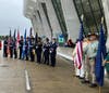 Outside the terminal preparing to honor buses.  To left are the color Guards for the Loudoun County ShVeeriff and Transportation Security Agency.  To right are a portion of the Combined Virginia SAR Color Guard
