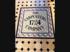  "The Carpenters Hall Company 1724" inset in the entry floor of Carpenters hall 