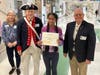 1st place check and certificate presented to Lasya Gampa.  L-R:  Paula Schwoerer, Barry Schwoerer, Lasya Gampa, Martin Johnson