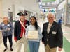 2nd place check and certificate presented to Nishka Kayapanda.  L-R:  Paula Schwoerer, Barry Schwoerer Nishaka Kayapanda, Martin Johnson