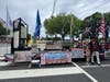 Right side of float with Brett Osborn from the Col. James Wood II Chapter VA SAR  in Regimental Uniform with unknown visitor