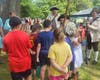 Demonstrating the operation of a Flintlock musket.  SAR members are L-R:  David Welker, Sean Carriganm Ken Bonner