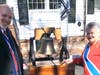 The President General SAR Michael Elston and the President General DAR, Jennie Storage ring the liberty bell on the SMJC Float