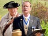 Virginia SAR President Darrin Schmidt with blessed soil. Behind the President is Pat Kelly