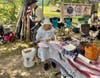 DAR member Paula Schwoerer demonstrating how to make a cornhusk doll