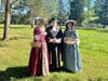 The Reverend Tom Costa portraying Reverend Massey with two DAR ladies in Colonial dress