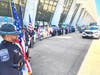 Multi-Agency Honor Guards outside Dulles terminal prepared to honor veterans as their buses pass by