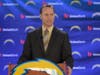 Bill Johnston at podium for San Diego Chargers 2013 Tom Telesco GM Announcement.
