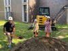 District 230 Board of Education member Mohammad Jaber, Board Secretary Sue Dalton and Board President Melissa Gracias strike their shovels to officially break ground on Stagg High School’s $15.5 million expansion project.