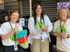 Andrew High School staff help pass out candy to students to kick off Start With Hello Week
