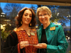 Dr. Souzan Naser (left) accepts her award from District 230 Foundation President Ann Oliver. A 1995 graduate from Stagg High School, Naser is an associate professor and counselor at Moraine Valley Community College.
