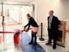 Student Council President Ella Debow cuts the ribbon to the new expansion project
