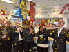 Tiease Holmes, 2023 Homewood Chevy Cares Giveaway winner, celebrates receiving her 2024 Chevrolet Trax