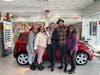 Willie Partee III, 2022 Homewood Chevy Cares Giveaway winner, pictured with his 2023 Chevrolet Spark