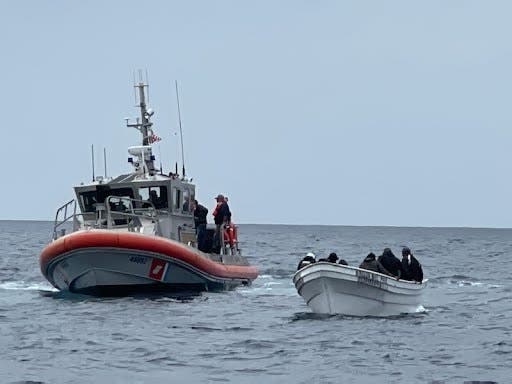Coast Guard officers rescued 19 migrants who were stranded in a disabled boat off the Coast of Redondo Beach.