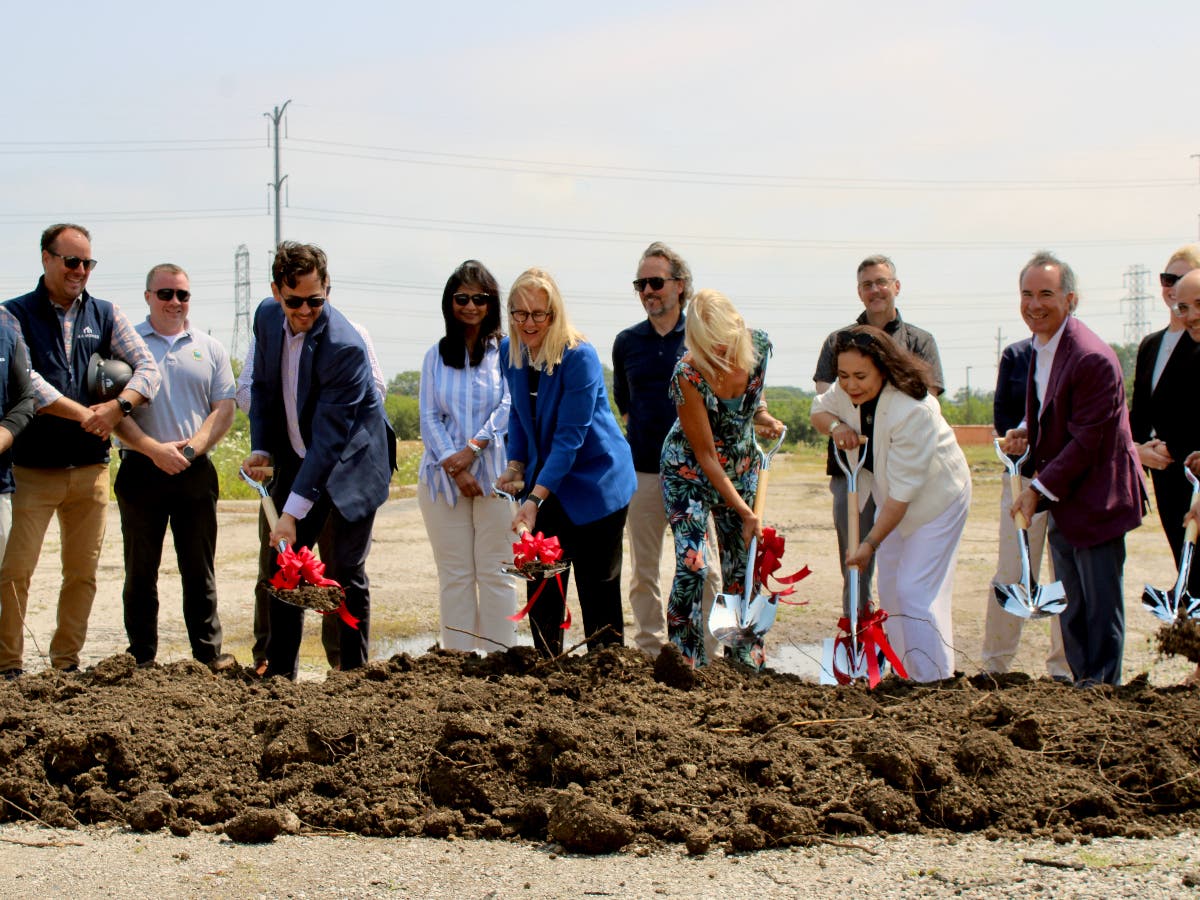 The development will turn the former industrial site into a residential neighborhood with townhomes, more than 9 acres of preserved open space, landscaped parkways and community amenities.