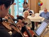 Students from Healing with Music’s Syosset Chapter Perform for Seniors at Grandparent's Day Celebration