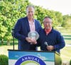 President and CEO of ACLD Robert Ciatto (right) presents Golf Outing honoree Mitch Cohen (left), President and CEO of DRP Solutions.