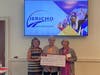 The First Congregational Church of Ridgefield Missions' Team presents Lisa Siedlecki (middle), the Co-Executive Director of the Jericho Partnership of Danbury a check for $10,00 for their new Offsite After School Learning Program.