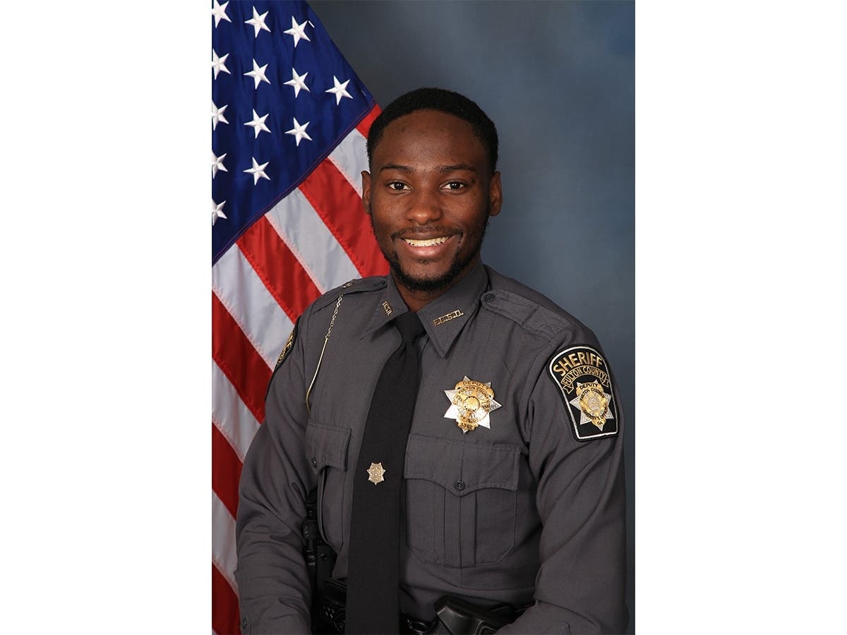 Deputy James Thomas, 24, dies after being shot Thursday. His body was found in his personal car at Bolton Road.