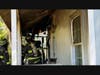 Crews with the Cherokee County Fire and Emergency Services work a house fire Monday afternoon at Pearidge Road.
