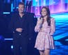 Megan Danielle, a Douglasville native, makes it to the Top 5 of 'American Idol.' She stands alongside host Ryan Seacrest Sunday.