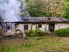 A Hogan Pond Lane house suffers a fire Tuesday morning. No injuries were reported in the fire.