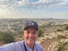 As Nazareth sits in the background, Georgia Sen. Russ Goodman stands atop Mount Precipice while visiting Israel.