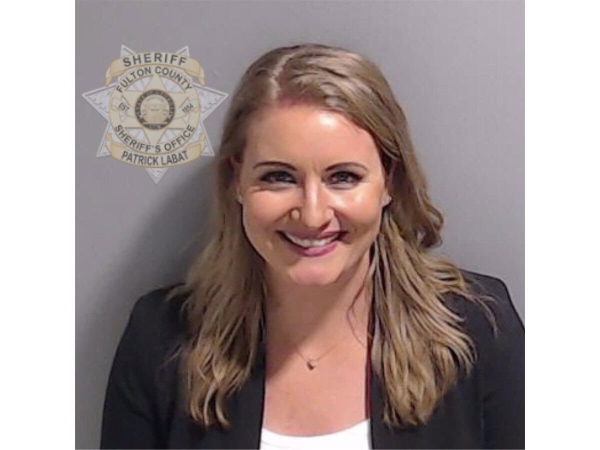 This booking photo provided by the Fulton County Sheriff's Office shows Jenna Ellis on Wednesday, Aug. 23, 2023, in Atlanta, after she surrendered and was booked.