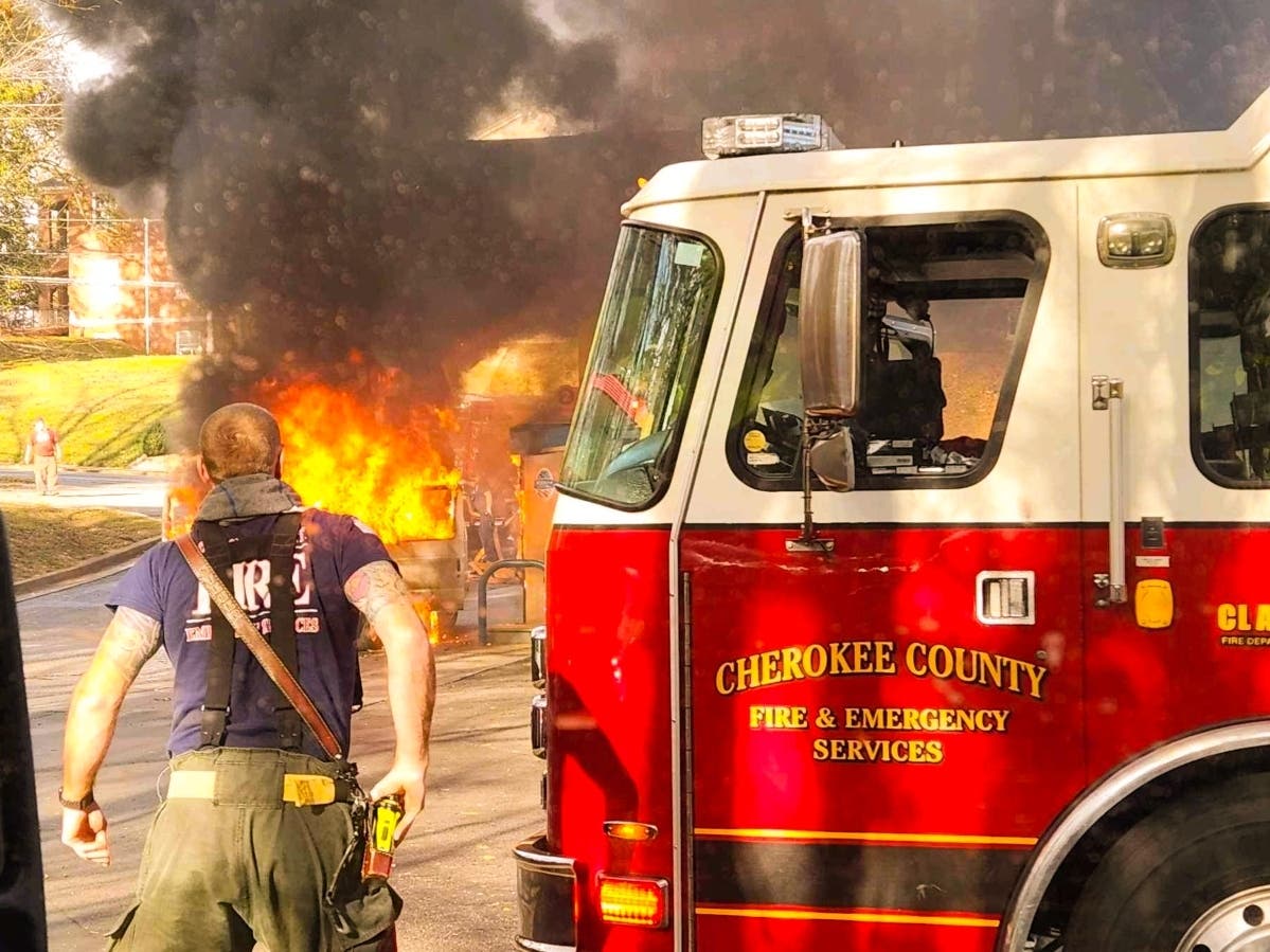 Cherokee County firefighters respond Monday to a gas station fire near the intersection of Reinhardt College Parkway and Fincher Road.