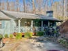 Cherokee County firefighters respond to a structure fire Tuesday at Upper Sweetwater Trail.