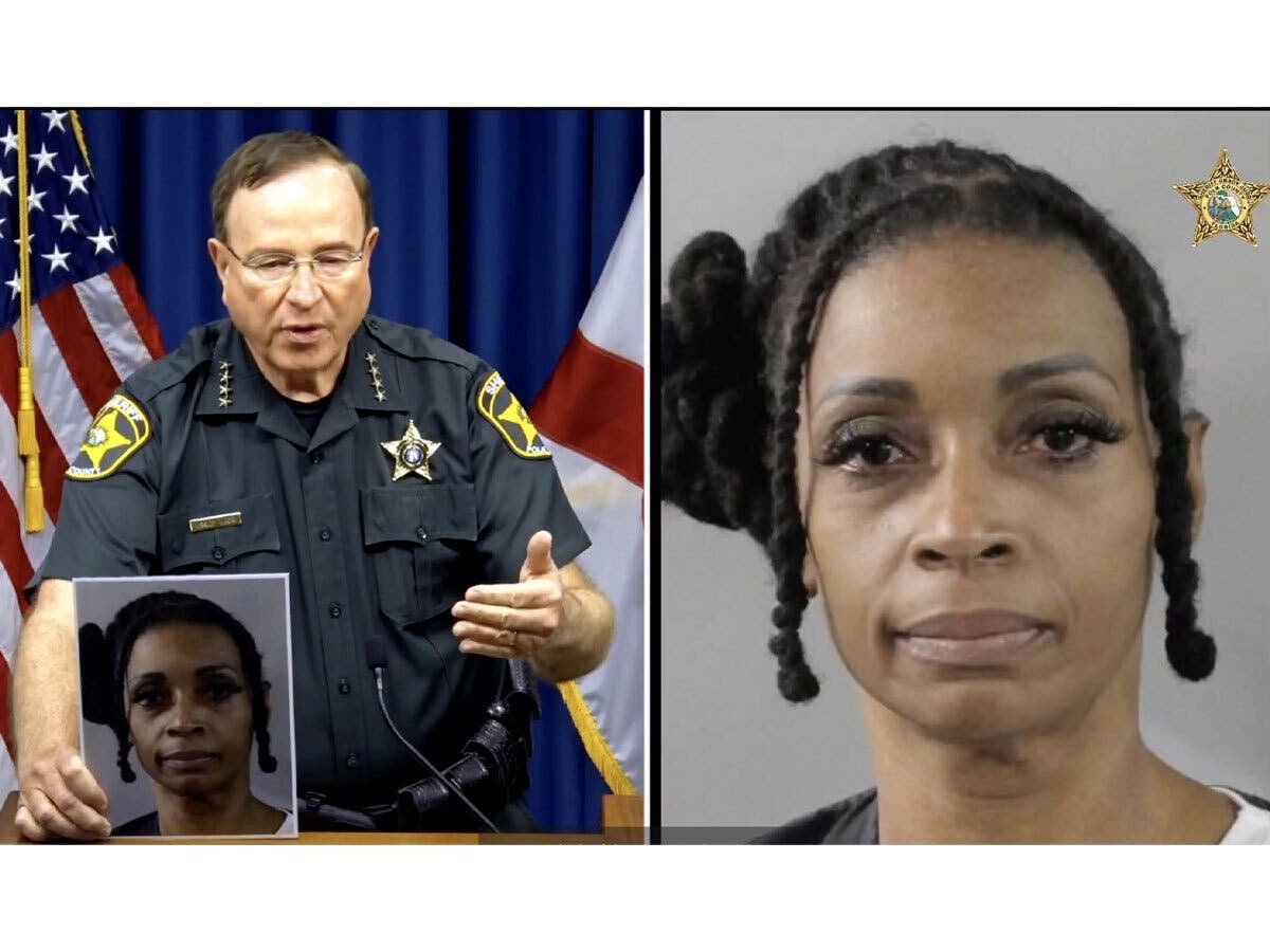 Polk County Sheriff Grady Judd holds a press conference Thursday to announce the arrest of Tamesha Knighten, who is accused of purposely poisoning her neighbor's three pets because they came into her yard.