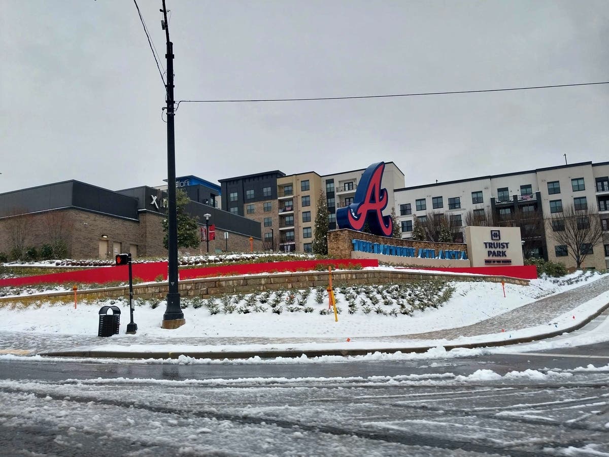 Truist Park near Atlanta's Cumberland area sits covered in snow during a winter storm in January 2025. A winter storm is set to return Saturday night into Sunday in Georgia.